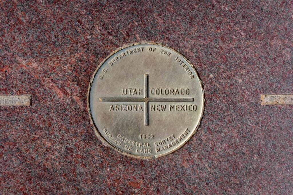 The Four Corners Monument marks the quadripoint in the Southwestern United States where the states of Arizona, Colorado, New Mexico, and Utah meet.