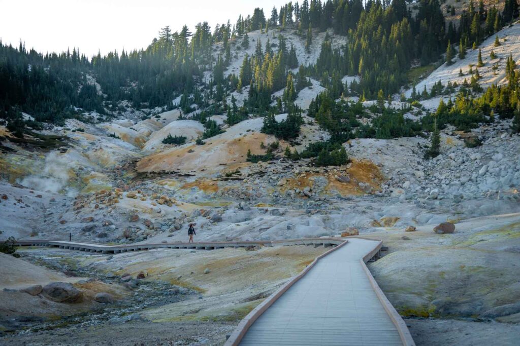 Adventurous catherine xu walking on the boardwalks of the geothermal wonders at Bumpass Hell