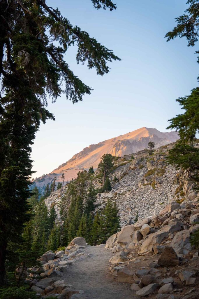 lassen people with a trail leading towards the peak