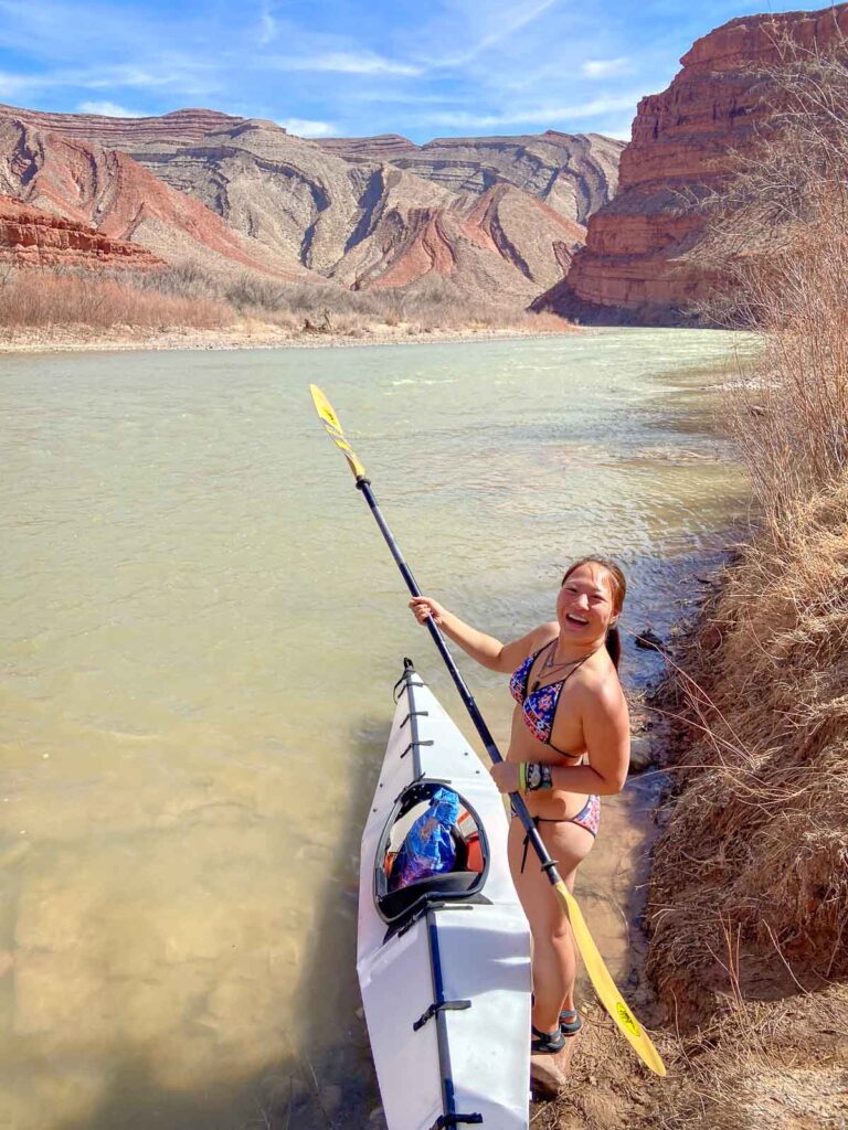 catherine xu about to kayak the colorado river in moab, utah