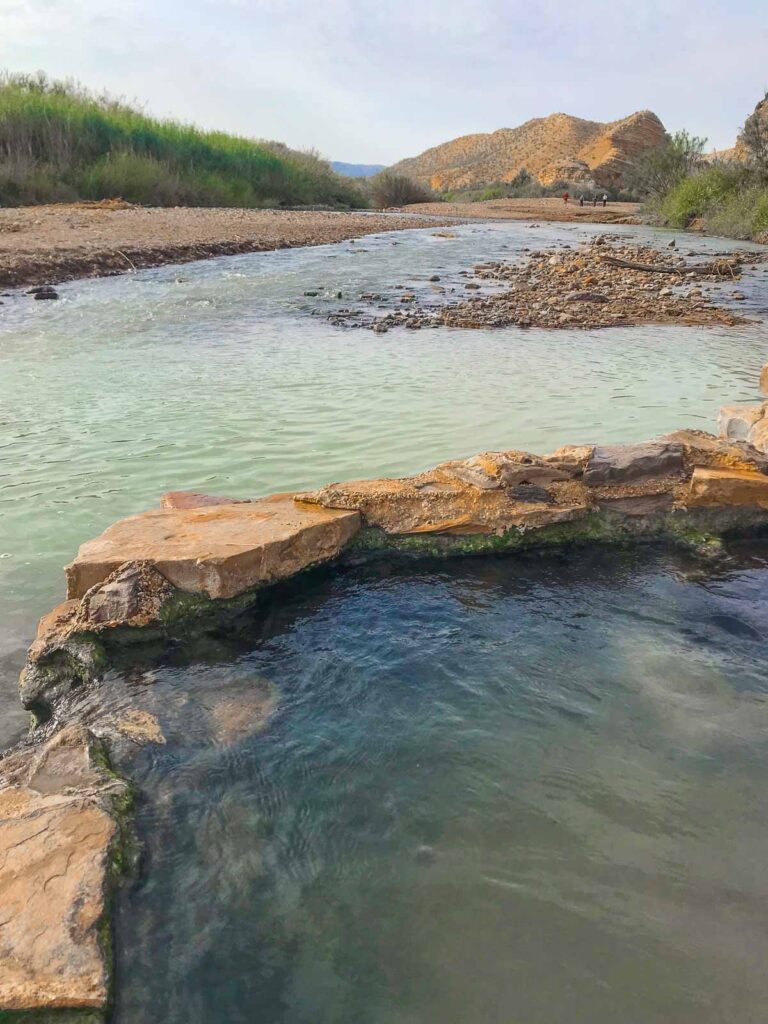 rio grand hot springs with the mountain in the background, a place not possible to see on a one day in big bend national park itinerary