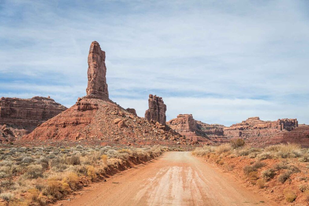 Driving on the dusty roads of Valley of the Gods buttes 