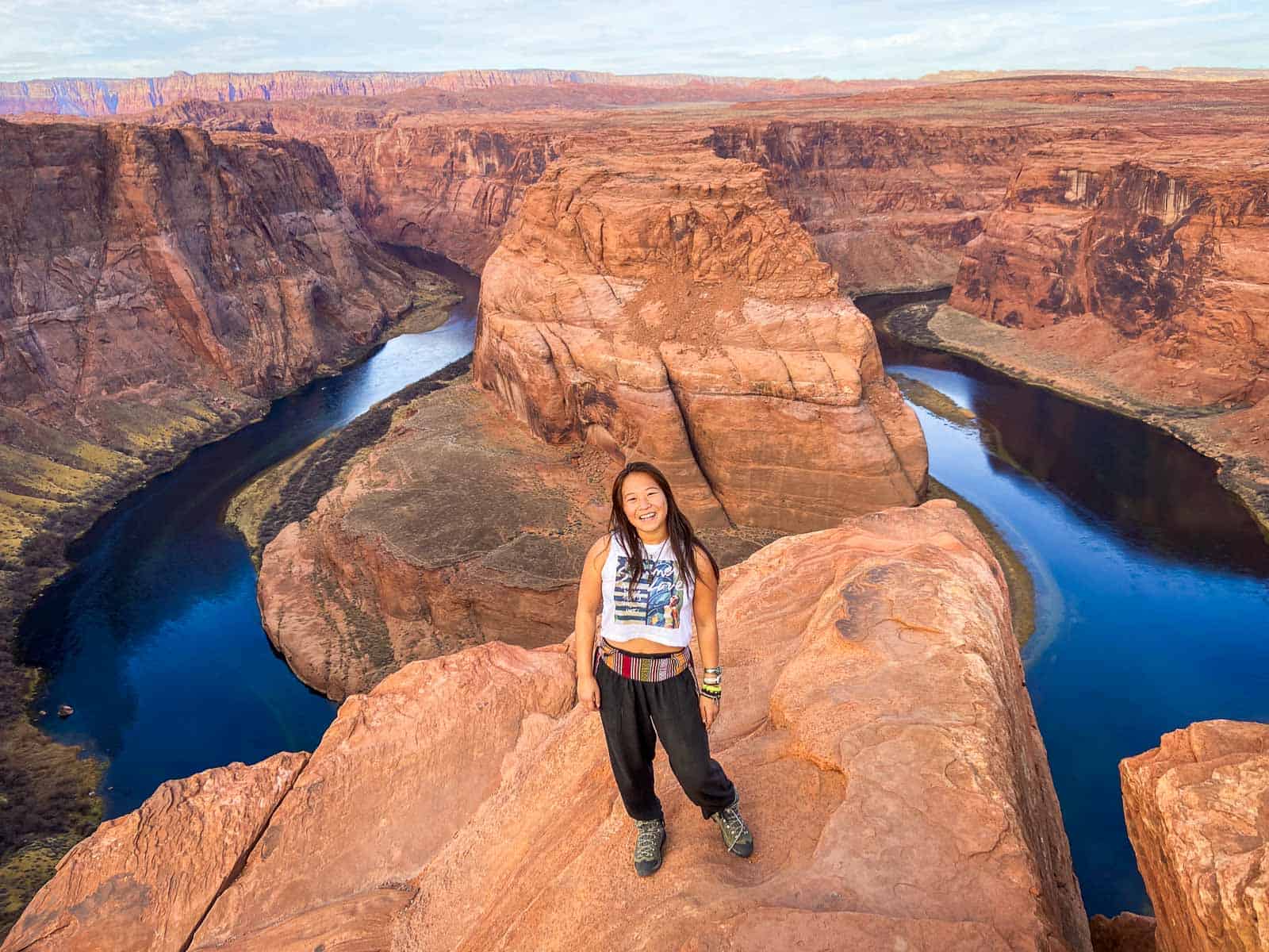 Catherine Xu standing on the edge of horseshoe bend in arizona