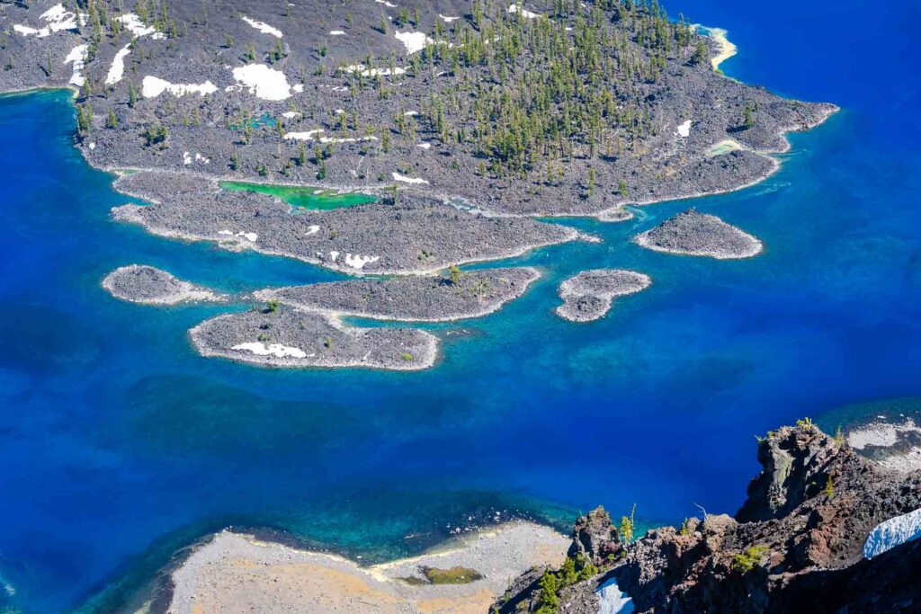 close up of the channel between wizard island and the crater walls in crater lake national park