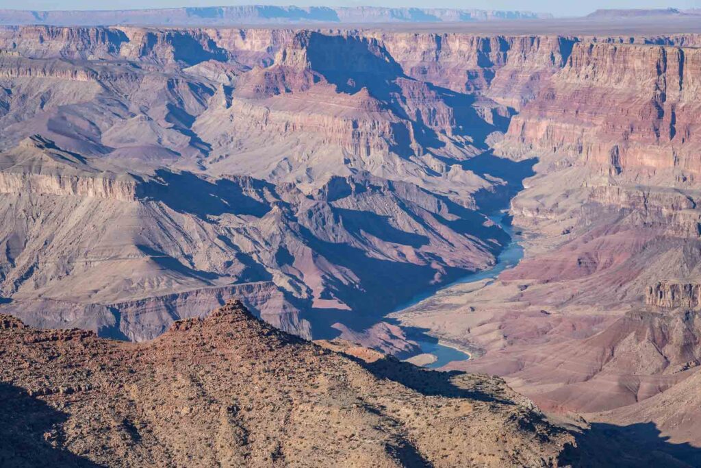 the colorado river flowing through the grand canyon on a one day in grand canyon south rim itinerary