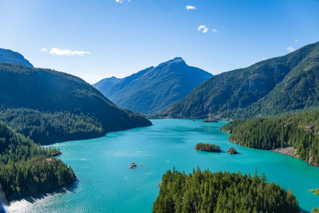 the diablo lake blue waters in north cascadades national park surrounded by greenery