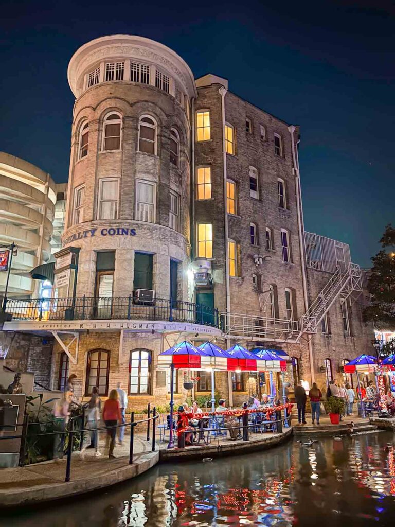 san antonio cafe and bulding along the riverwalk at night