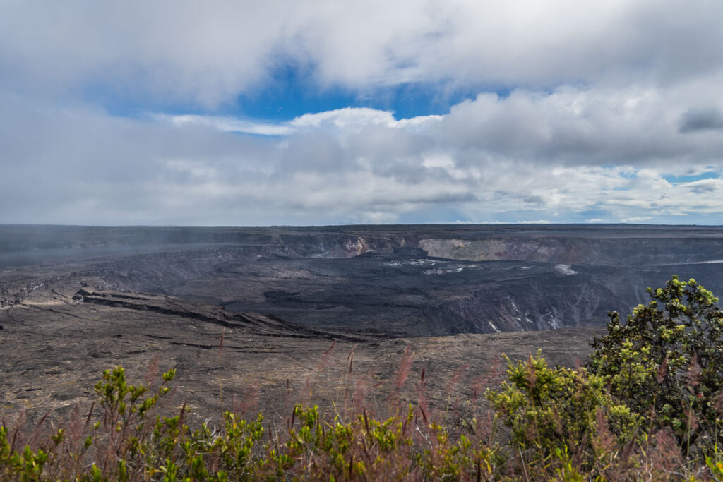 the Halema’uma’u Crater from afar in volcano national park in big island hawaii