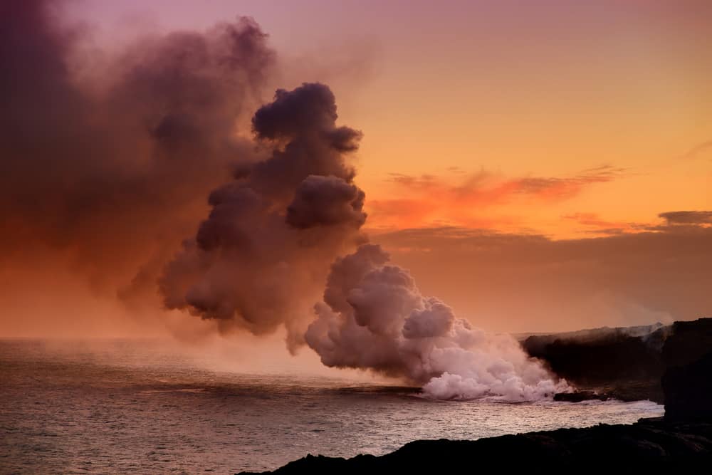 Lava pouring into the ocean creating a huge poisonous plume of smoke at Hawaii's Kilauea Volcano, Big Island of Hawaii