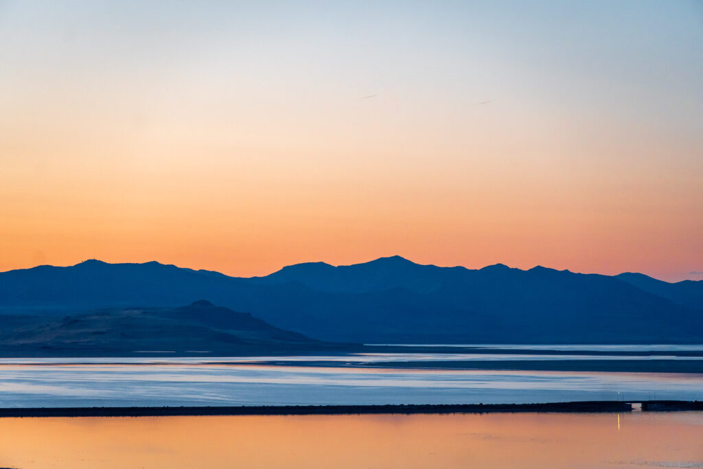 Sunset colors on the Great Salt Lake with the mountain ranges