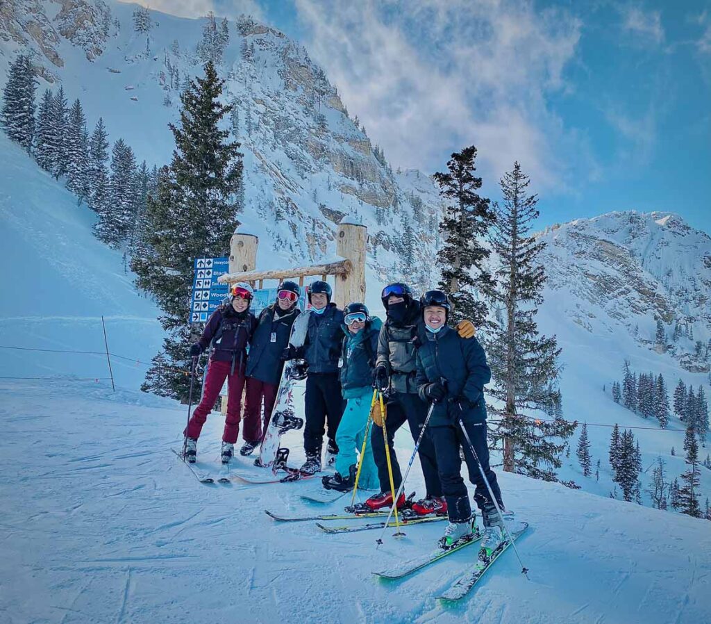 Catherine and friends at one of the salt lake city ski resorts during wintertime, the best time to visit salt lake city for snow sports