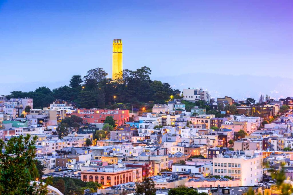 The dusk view of Coit Tower overlooking San Francisco