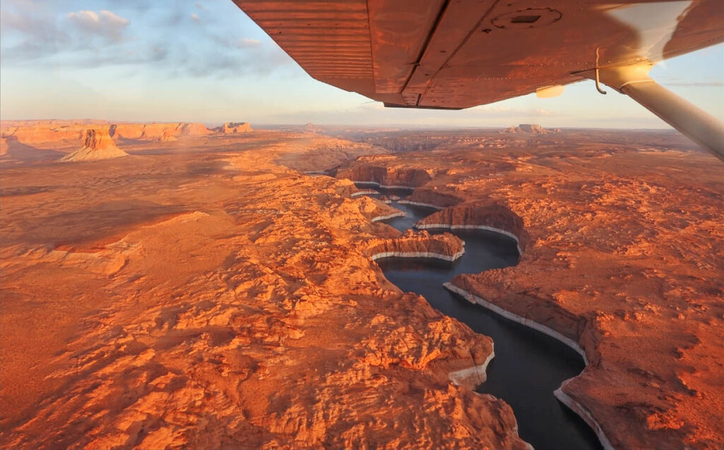 Magnificent lake Powell and canyon Antelope on a sunset photographed from the plane.