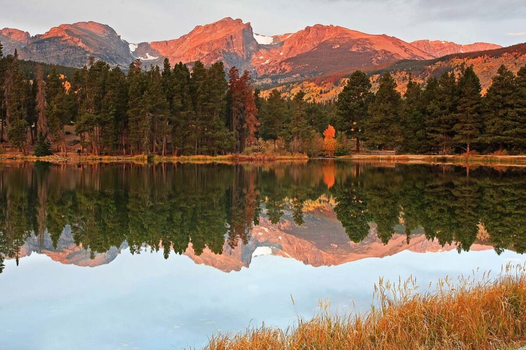 Early morning reflection of Hallet Peak in Sprague Lake at Rocky Mountain National Park.