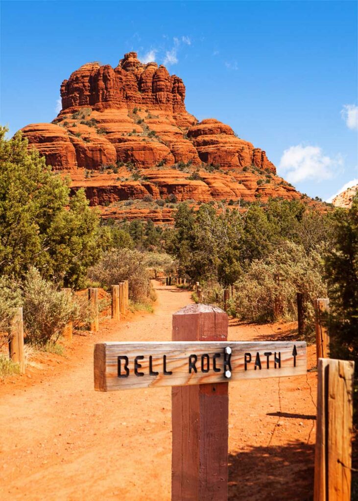 Scenic view of Bell Rock in Sedona, Arizona USA with path marker at trail head