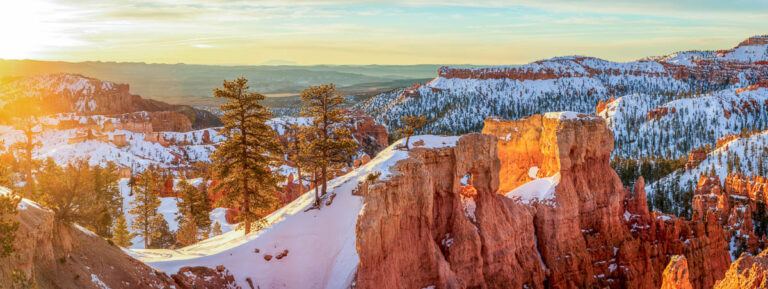 snow covered sandstone formations in Bryce Canyon
