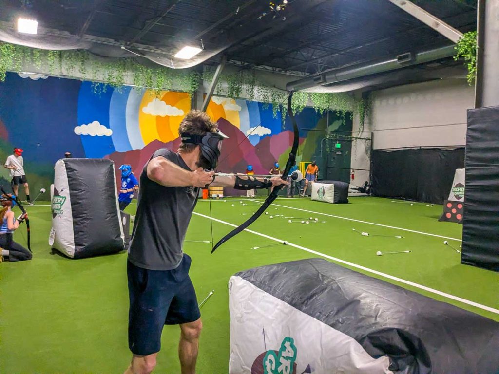 Man doing archery at Denver Archery Games
