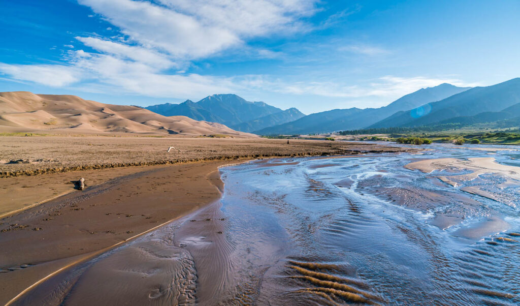 the best time to visit Great sand dunes national park is in the spiring with the Medano Creek flowing