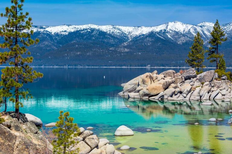 Blue waters of Lake Tahoe beach with the sierra mevadas in the background