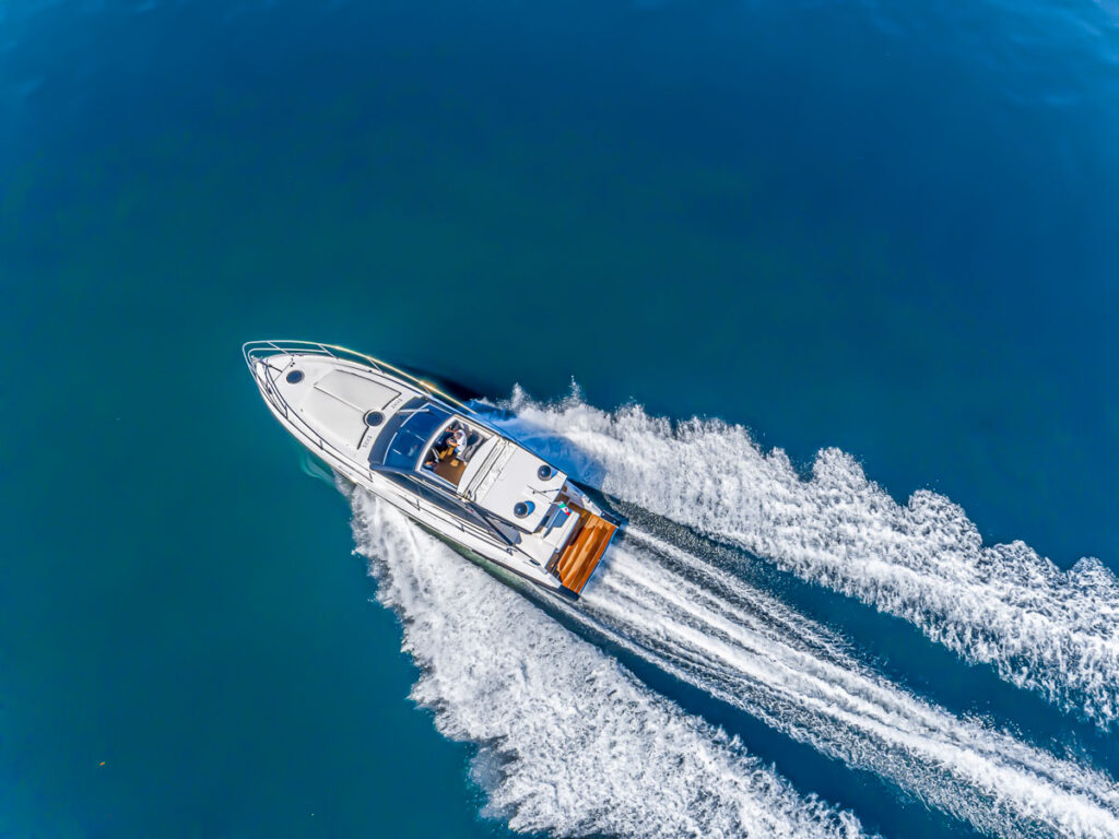 Aerial view of speed boat on lake