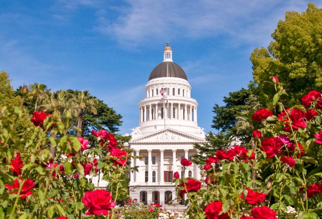 Sacramento Capitol Building framed by the rose garden