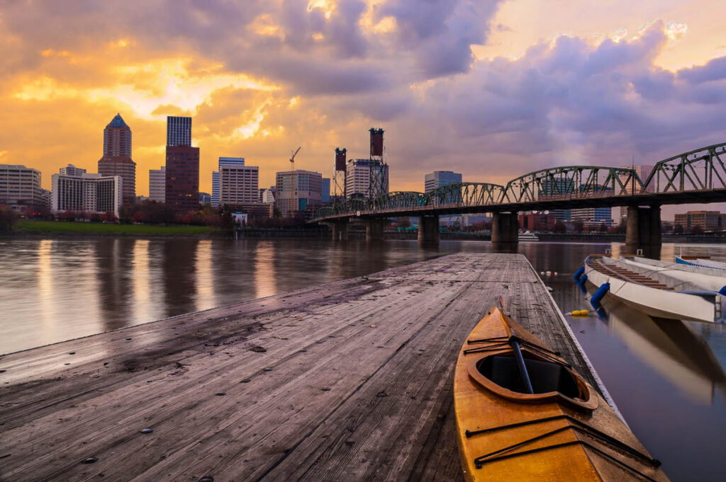 Marina along Willamette River in Portland Oregon Downtown Waterfront with a kayak at sunset