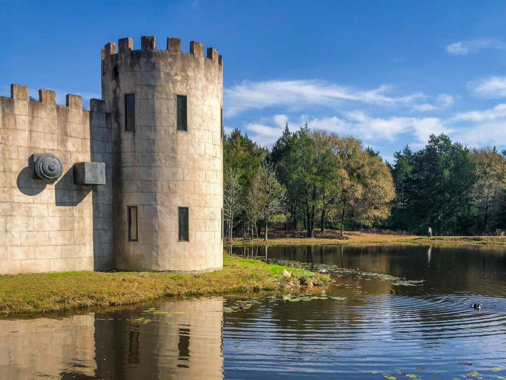 Texas Bellville Newman's Castle sitting on the edge of the lake