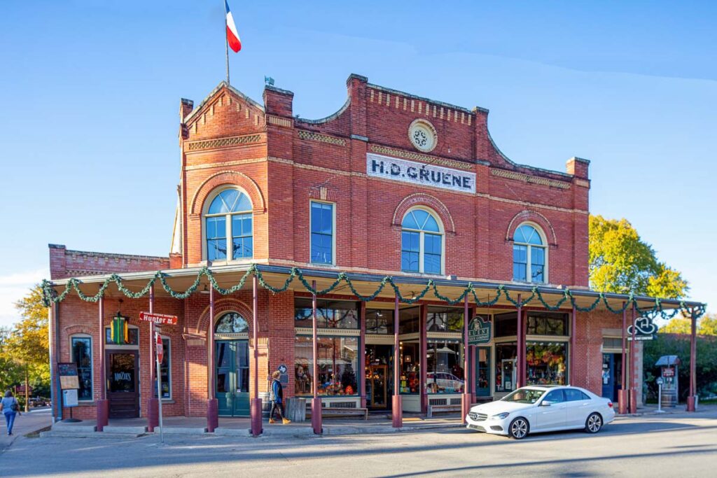 Old brick building housing an antique store in Gruene