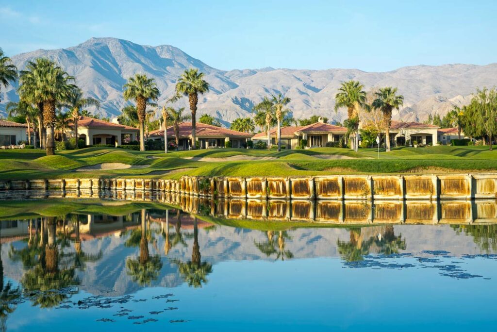The calm water reflecting the golf course in Palm Springs
