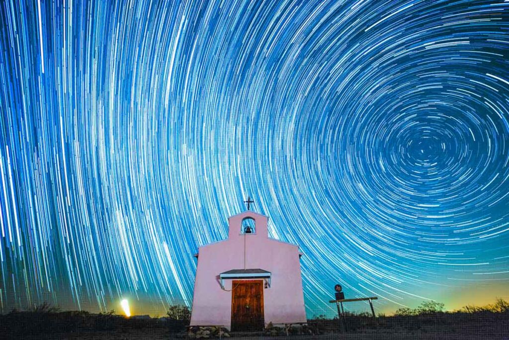 Texas Balmorhea State Park Calera Chapel with a long-exposure star trail