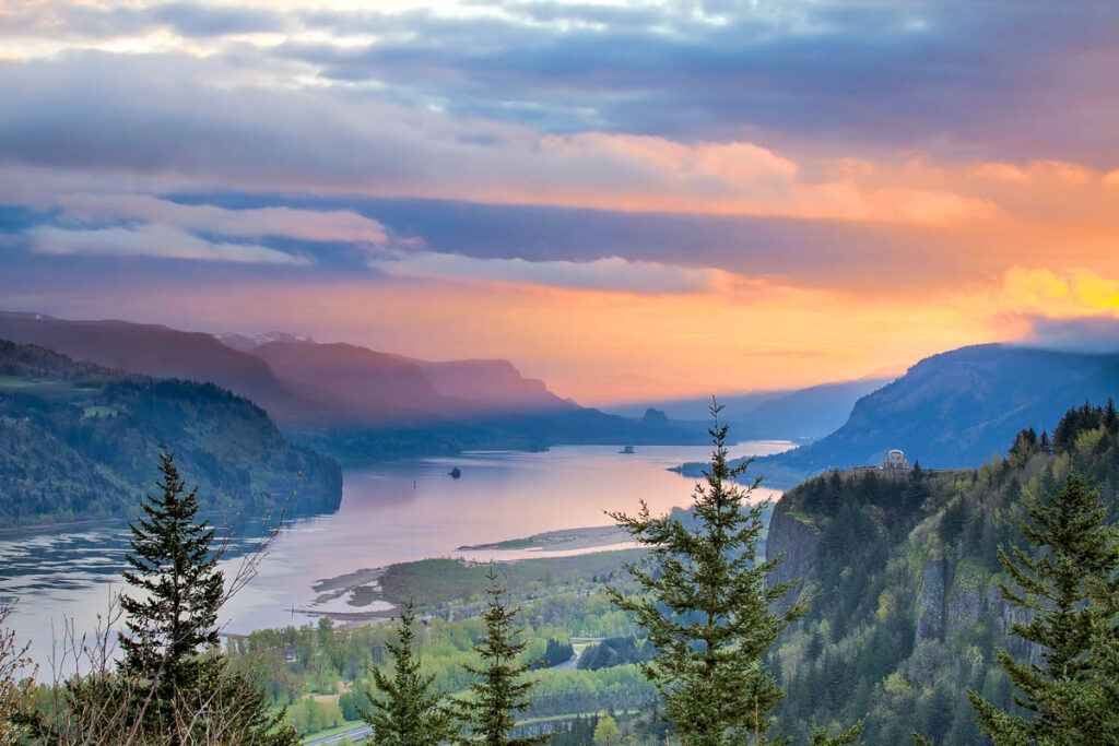 Sunrise Over Vista House on Crown Point at Columbia River Gorge in Oregon with Beacon Rock in Washington State