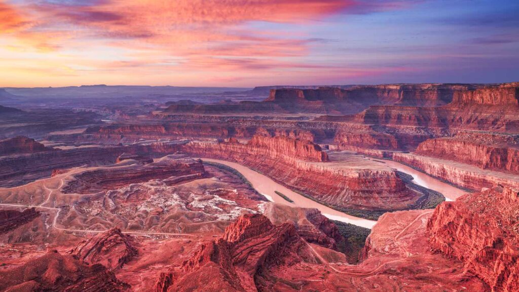 Colorful sunrise at Dead Horse Point, Colorado river, Utah, USA