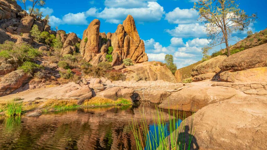 Lake Bear Gulch and rock formations, in Pinnacles National Park in California, the ruined remains of an extinct volcano on the San Andreas Fault. Beautiful landscapes, cozy hiking trails for tourists and travelers.