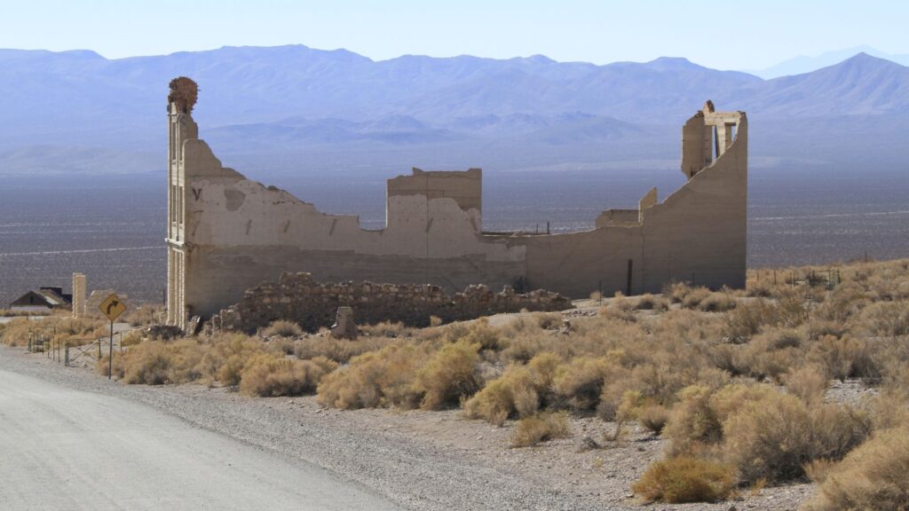 Old building ruins in Rhyolite Ghost Town in Death Valley, California