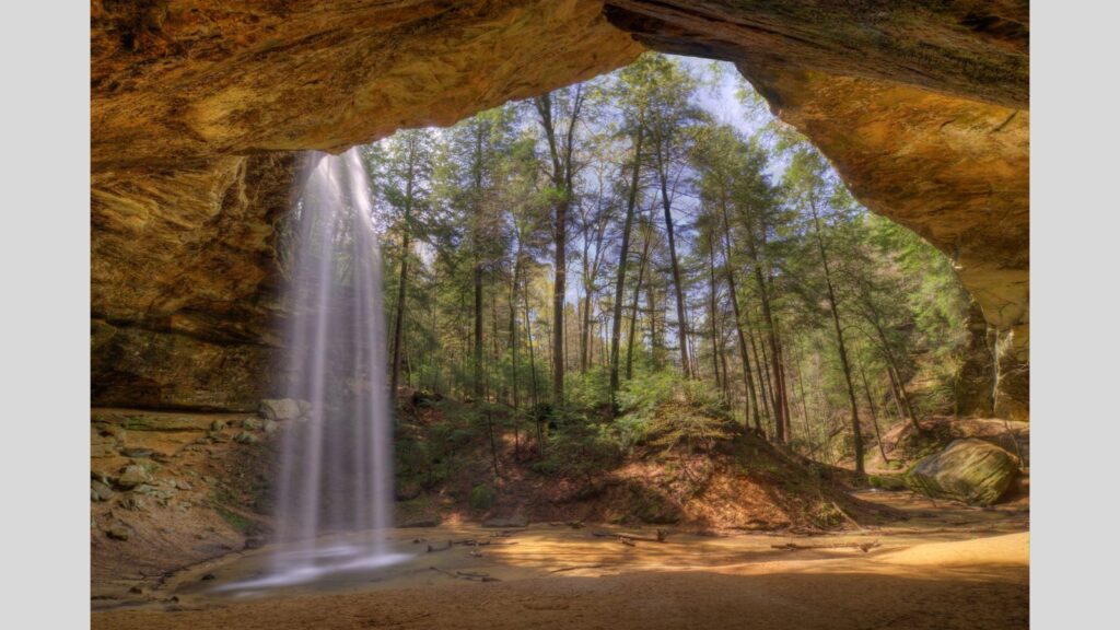 Georgia, Ash Cave Waterfall Flowing Through Entrance