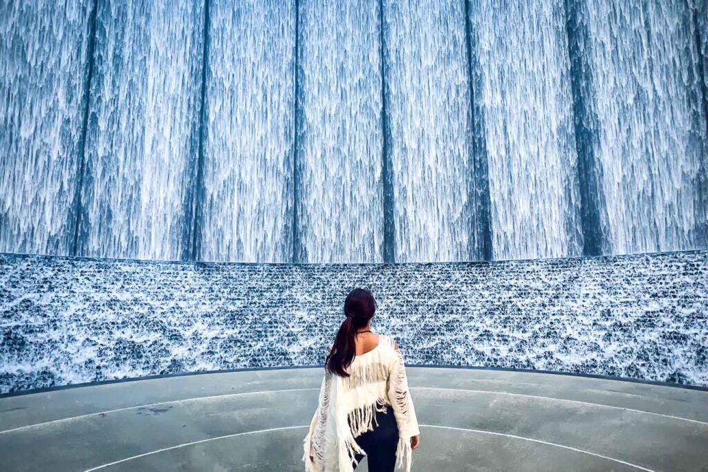 Cat Xu in white at Gerald D. Hines Waterwall Park houston