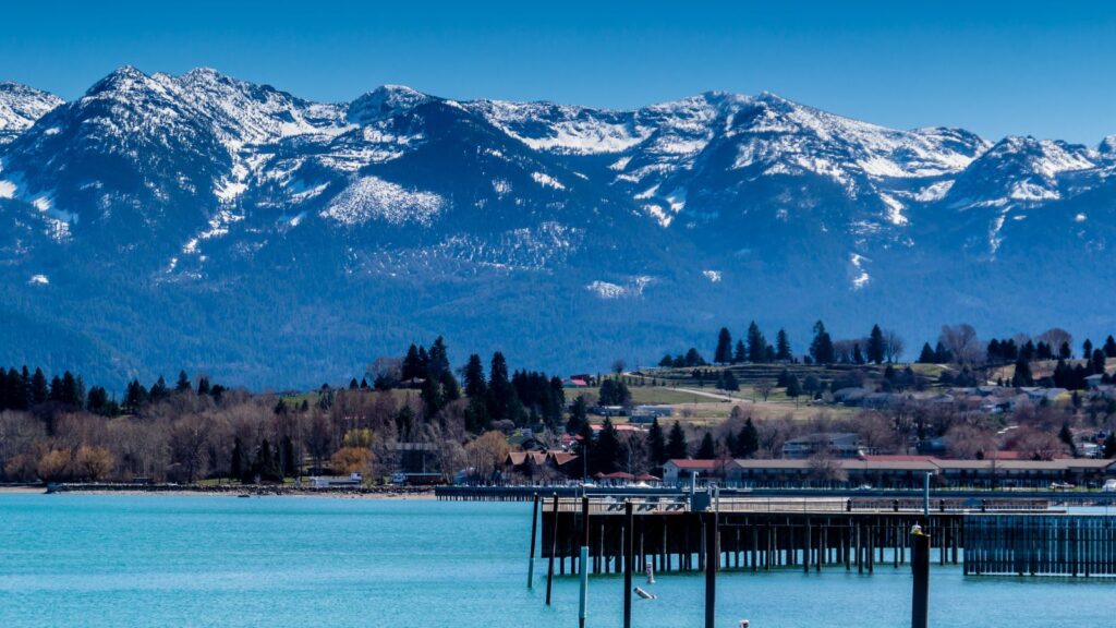 Pier in front of the mountains of Montana, Flathead Lake, Polson