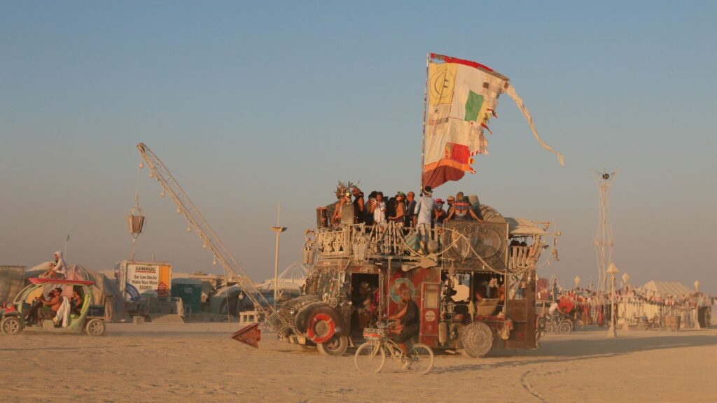 People celebrating Burning Man, the ultimate of Hippie Festivals 