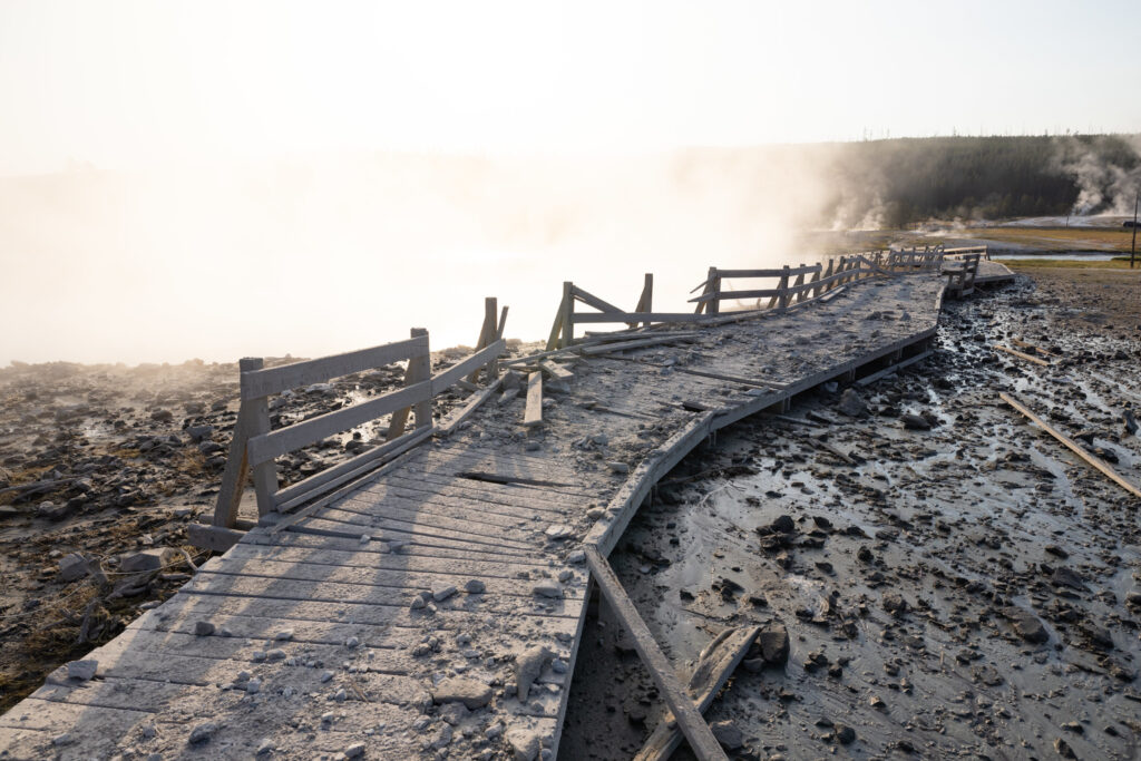 Boardwalk destroyed after a hydrothermal explosion at Yellowstone National Park's Biscuit Basin on July 23, 2024