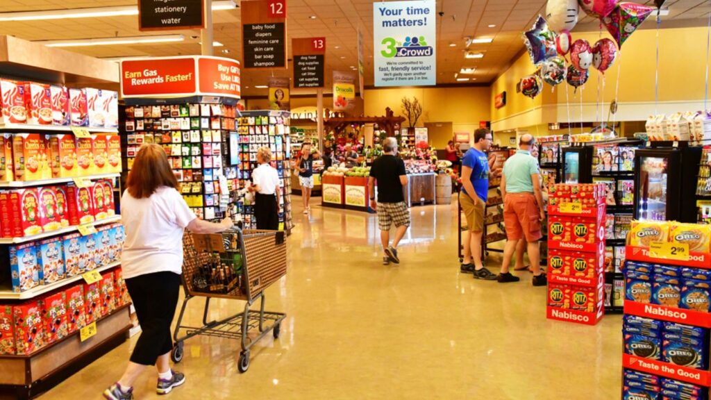 Ailes in supermarket with sweets like cookies, candies, chocoloate biscuits