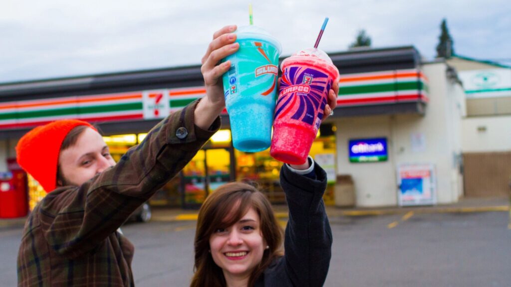 couple holding their large slurpees