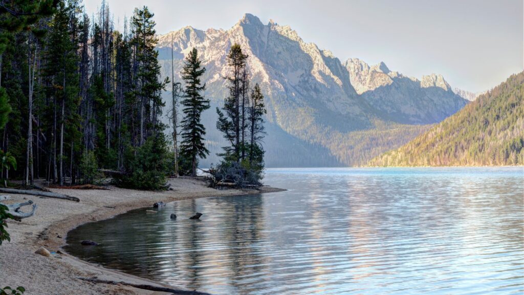 Mountains surrounding peaceful Redfish Lake, one of the Beautiful Places in Idaho