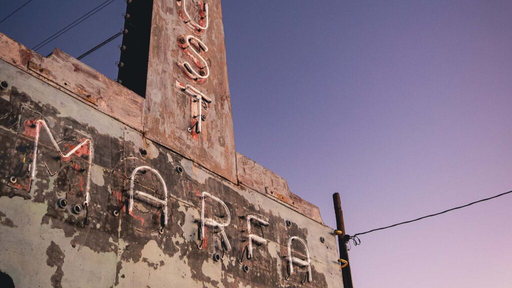 Texas Marfa abandoned sign at dusk