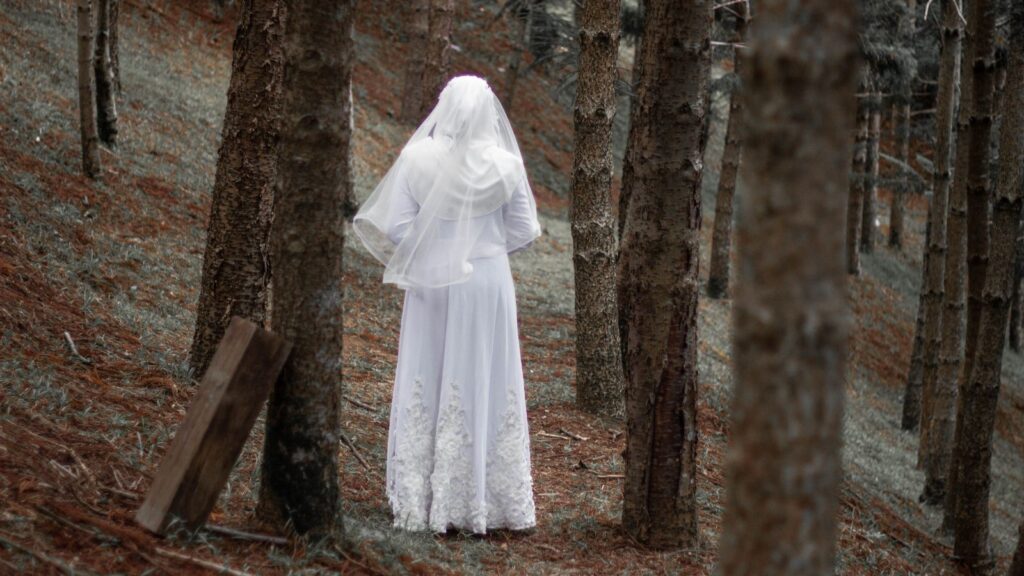 the lady in white in the middle of the woods