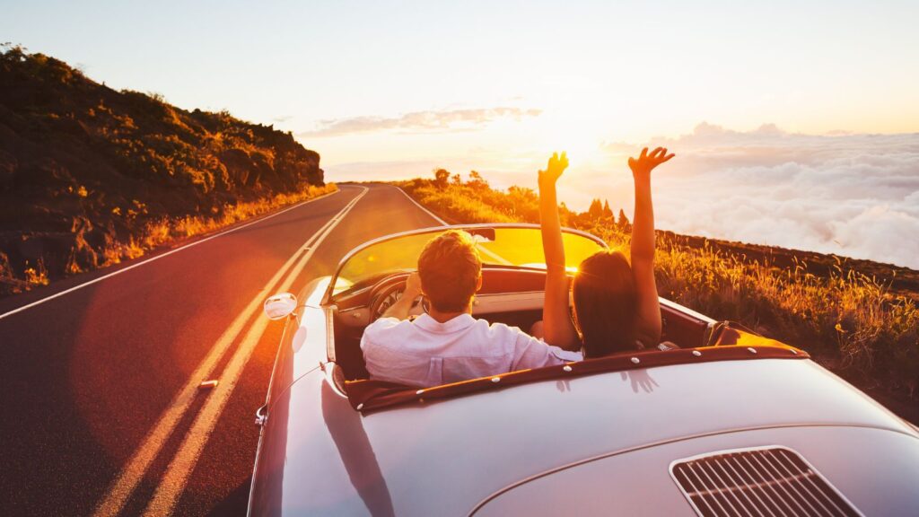 couple driving down the road