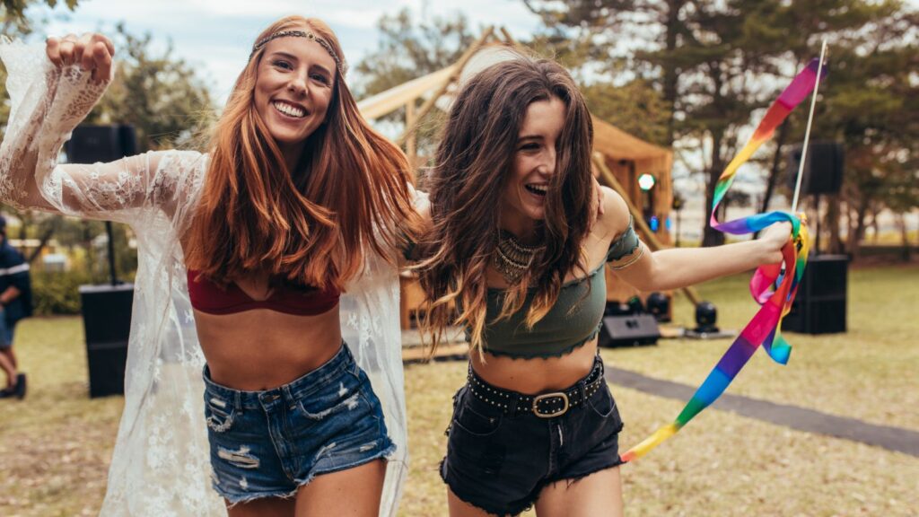 Two Girls holding each other at a Festival