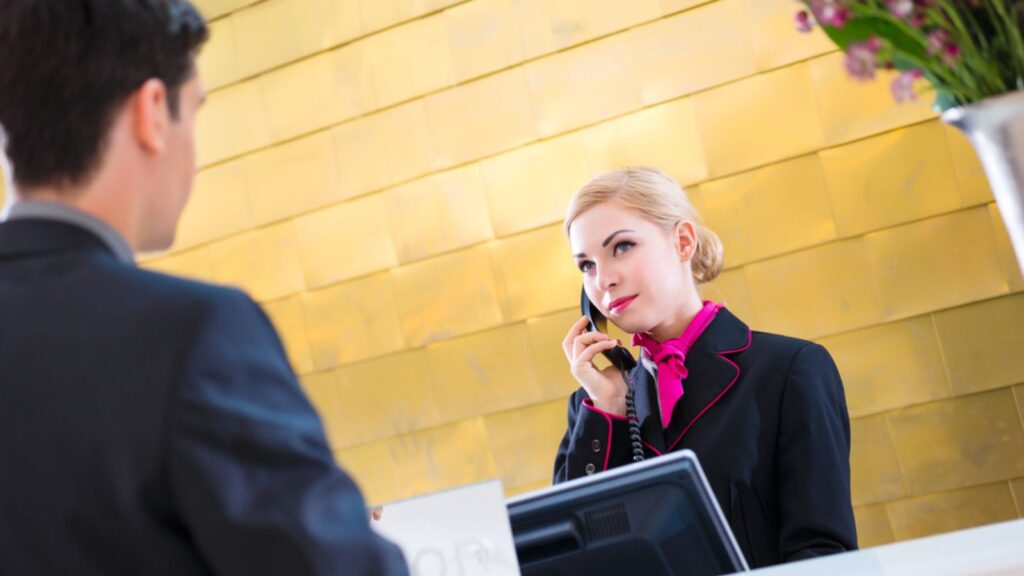 receptionist talking to the guest