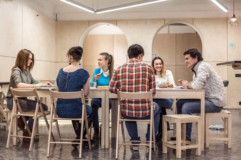 group of friends sitting at table