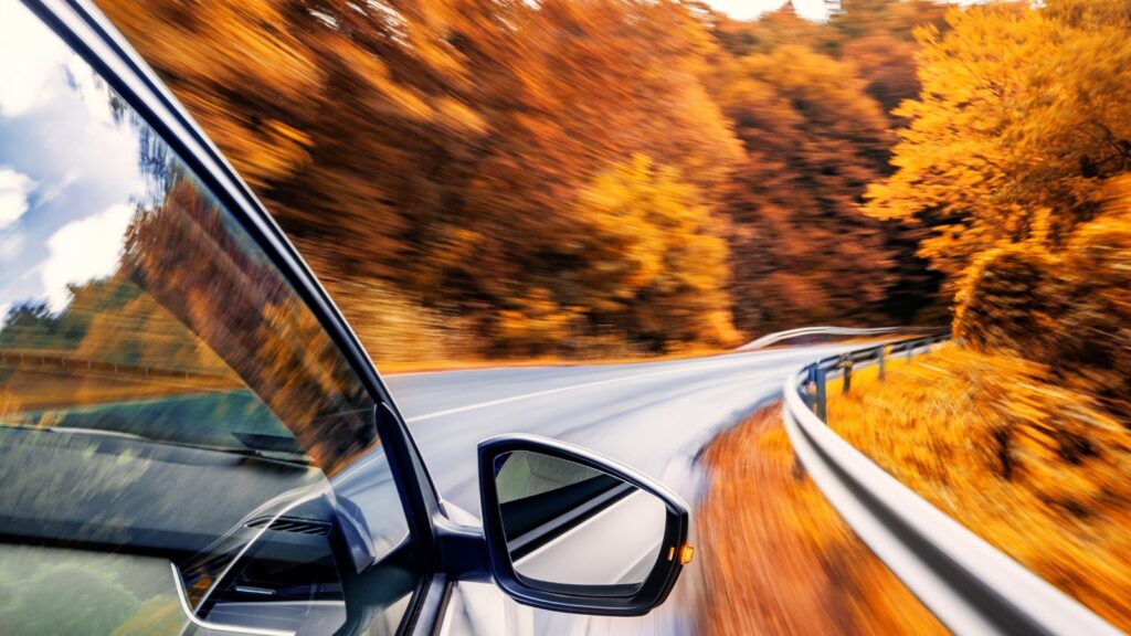 Driving in the fall on road