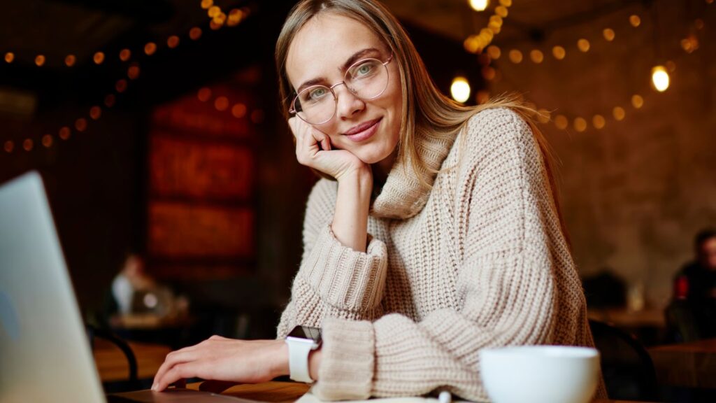 Pleasant woman remote worker with laptop